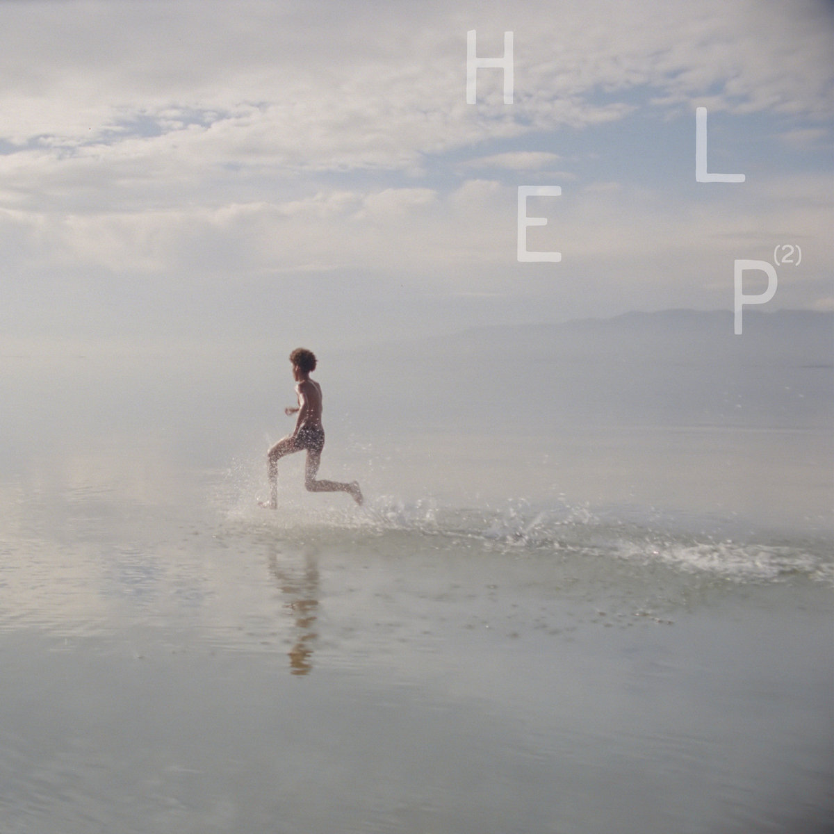 Portada del disco Help 2 de War Child Records.
